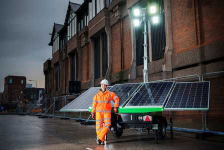 A Trime solar hybrid lighting tower working in road maintenance with zero noise and zero emission