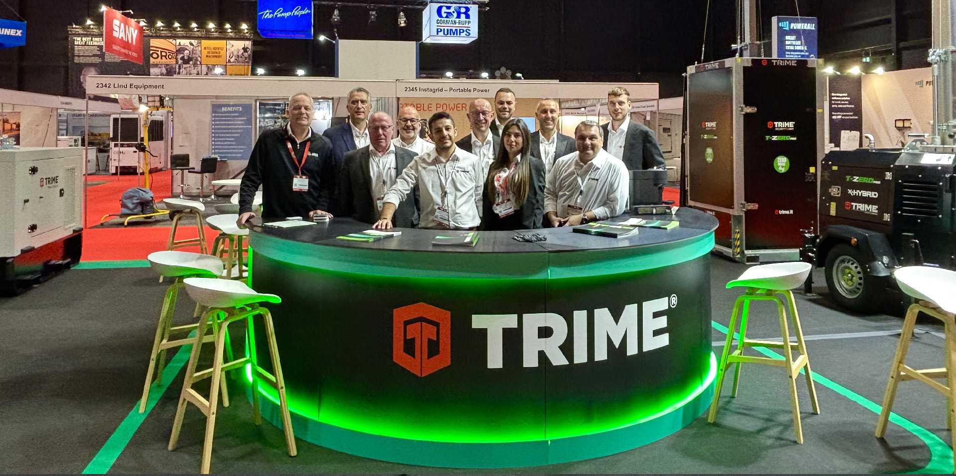 The Stand with the Staff of Trime posing during IRE 2026