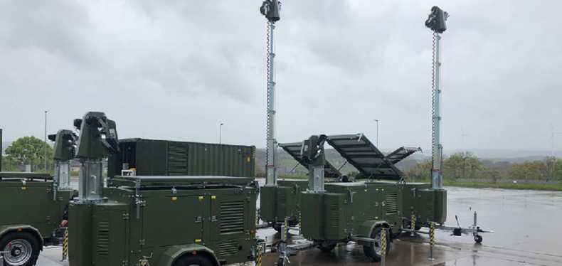 Trime X-Solar Hybrid Lighting Tower with deployable solar panel and automatic mast with high efficiency led lamps in military site