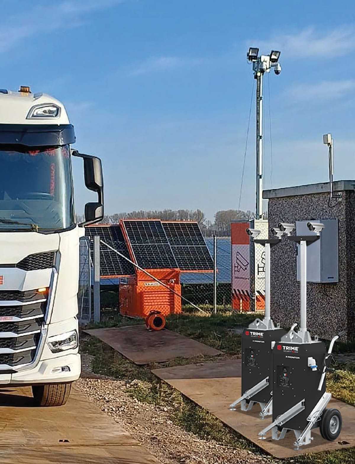 a pair of X-MONITORS monitor the entrance to a construction site