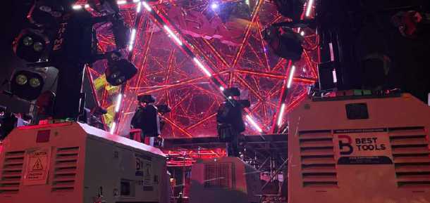 Two trime lighting tower working in a event