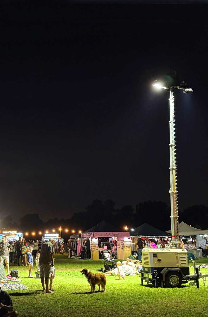Silent full battery Trime lighting tower in a park 