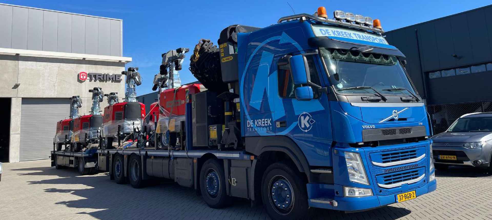 A fleet of X-Hybrid one fo the Trime Hybrid Lighting Towers being transported on a truck