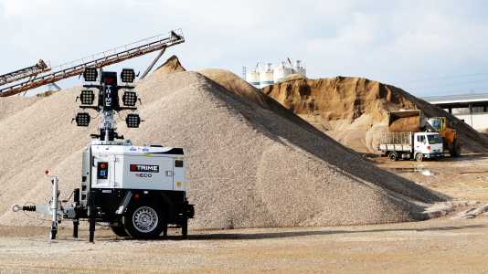 a Trime X-ECO lighting tower operating in a large quarry